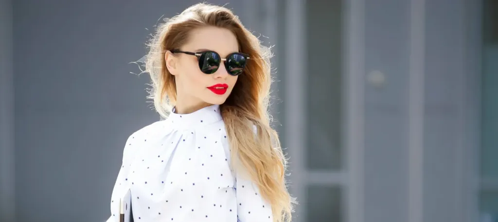 Woman with glasses and phone